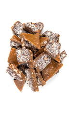 Homemade almond roca isolated on a white background