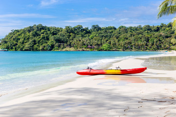 kayaks on the tropical beach with beautiful sky