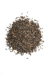 Pile of thistle seed isolated on a white background