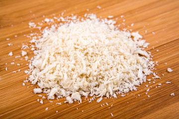 Plain white bread crumbs isolated on a wood background