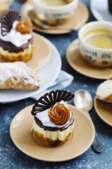 Mini cheesecake and cup of coffee