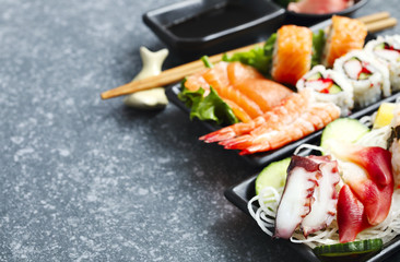 Sushi Set. Different sashimi, sushi and rolls