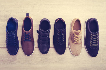 Leather shoes on wooden background