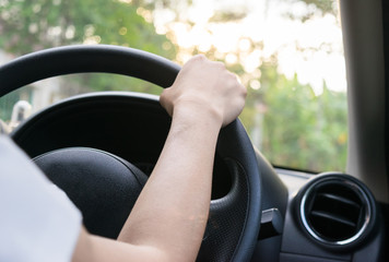 Woman driving car Sunlight 