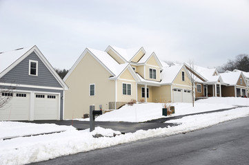 Fototapeta na wymiar houses in residential community after snow in winter