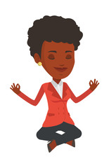 Peaceful businesswoman meditating in lotus pose.