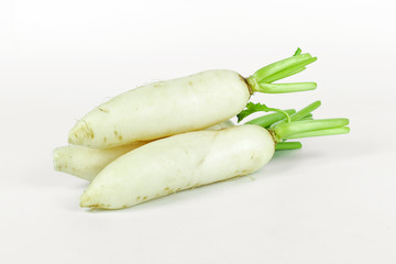 fresh slices white radish on wooden background, healthy vegatable