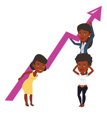 Fototapeta na wymiar Three businesswomen holding growth graph.
