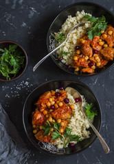 Lamb stew and bulgur. Delicious lunch. On a dark background, top view