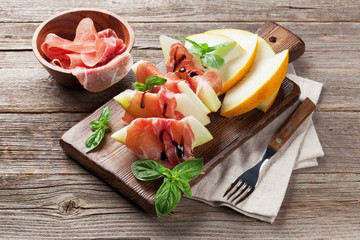 Fresh melon with prosciutto and basil
