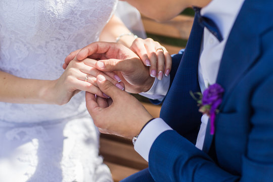 hands with wedding rings