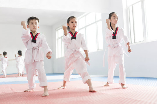 Little children practicing Tae Kwon Do