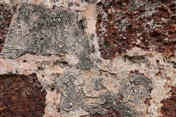 Weathered stone wall background of the ancient city.