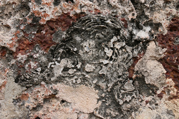 Weathered stone wall background of the ancient city.