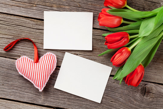 Red tulips, heart and photo frames