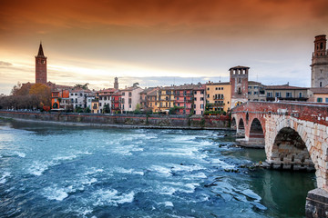 Verona, Italy. Scenery with Adige River and Ponte di Pietra. - obrazy, fototapety, plakaty