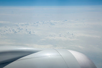 Fototapeta na wymiar View of cloud tops at 43000 feet