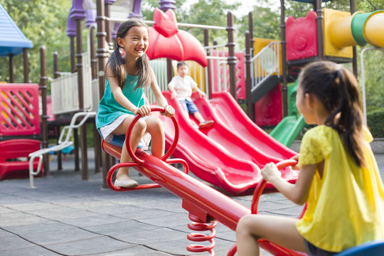 Happy children playing in park