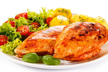 Roast chicken fillets, boiled potatoes and vegetable salad