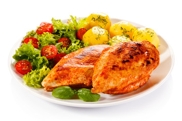 Roast chicken fillets, boiled potatoes and vegetable salad