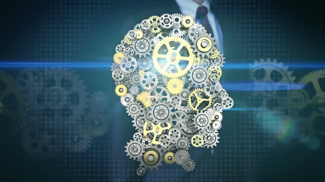 Businessman touching screen, Gears making human head shape. artificial intelligence, computer technology, humanoid science.