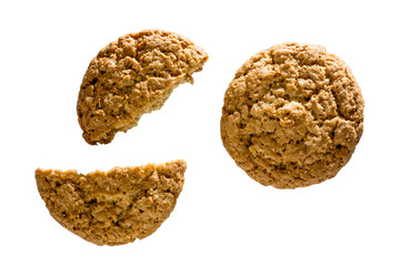 Top view of several oatmeal cookies isolated on white background.