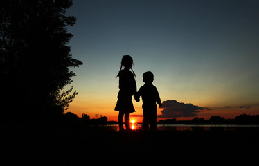 Fototapeta na wymiar silhouette of children