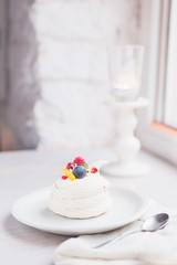 Mini Pavlova with fresh berries - classic dessert with a twist.