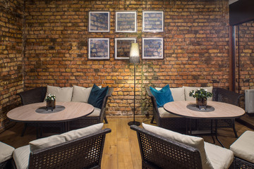 Interior of restaurant.  Brick wall. Modern design.