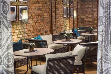 Interior of restaurant.  Brick wall. Modern design.