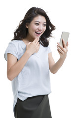 Happy young woman using smart phone
