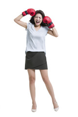 Young woman shouting with boxing gloves 