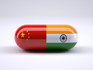 Pill with the Chinese and Indian flag wrapped around it