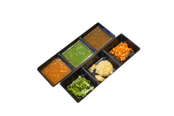 Bbq and seafood sauce isolated on white