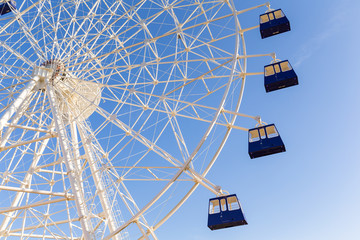 Ferris wheel with blue sky