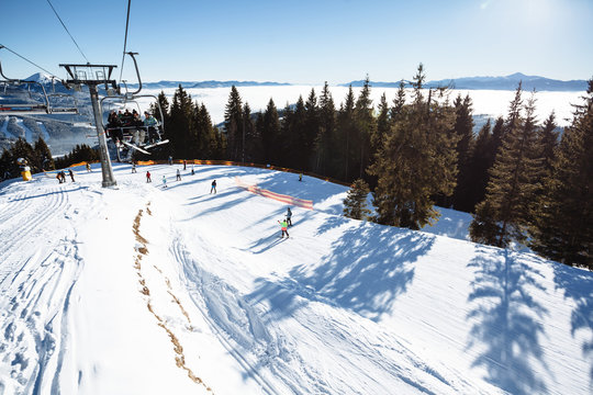 Ski resortand ski slope with  mountains panorama