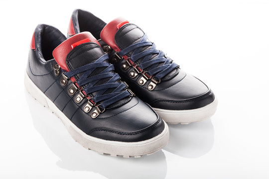 black men's shoes on a white background
