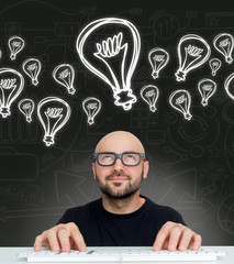 Bulb lamp icons going out of the head of a Young attractive bold