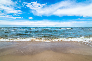 Fototapeta na wymiar Blue sky and sea beach, landscape, coast with waves in the summer vacation, Poland, Baltic
