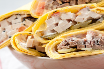 Various of tasty tortilla wraps on dark slate. Healthy street food