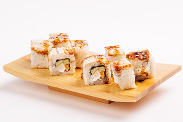 Sushi Roll on wood plate. Japanese cuisine
