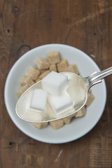 SUGAR CUBES ON CEREAL SPOON