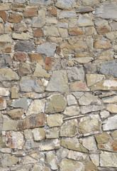 Wall of stones. Background.
Rough masonry. Stones of different sizes and colors.