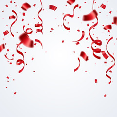 Red ribbon and confetti celebration isolated on white