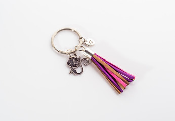 Fashionable key ring isolated on white, stylish boho jewelry