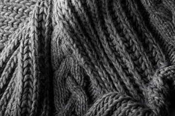 Handmade grey knitting wool texture background
