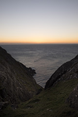 Fototapeta premium Upright image on the Sheeps Head Peninsula County Cork Ireland looking west over the Atlantic Ocean at sunset