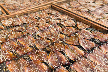 Dried fish dry in sunlight