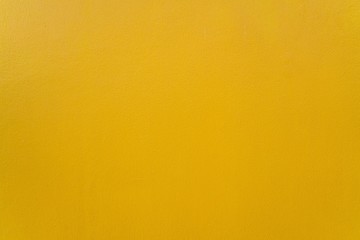 Obraz premium Yellow wall texture - Golden warm Background and copy space