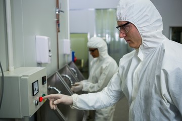 Technician operating machine